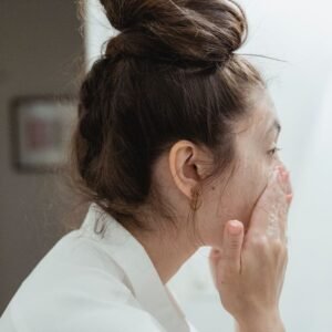 Woman washing face